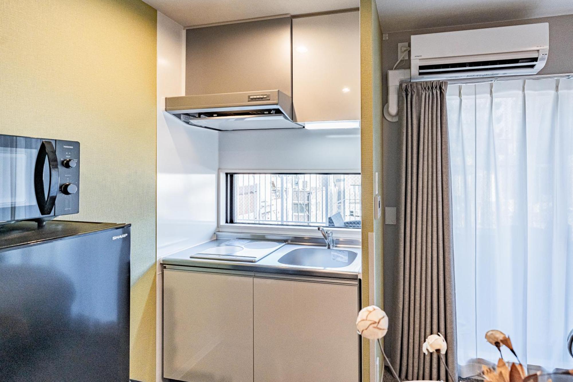 Apartment Hotel 11 Umeda Kamiyama Osaka Eksteriør billede
